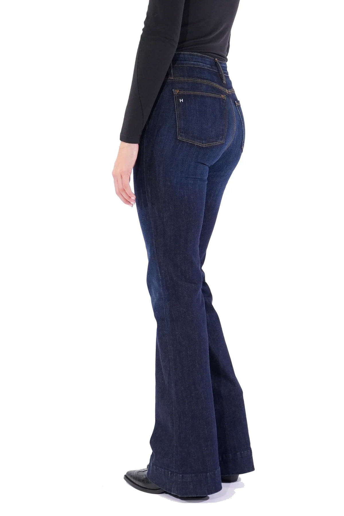 Haala Denim Bella flare jeans in deep ocean blue with gold accents, showcasing the stylish bottoms and relaxed fit.