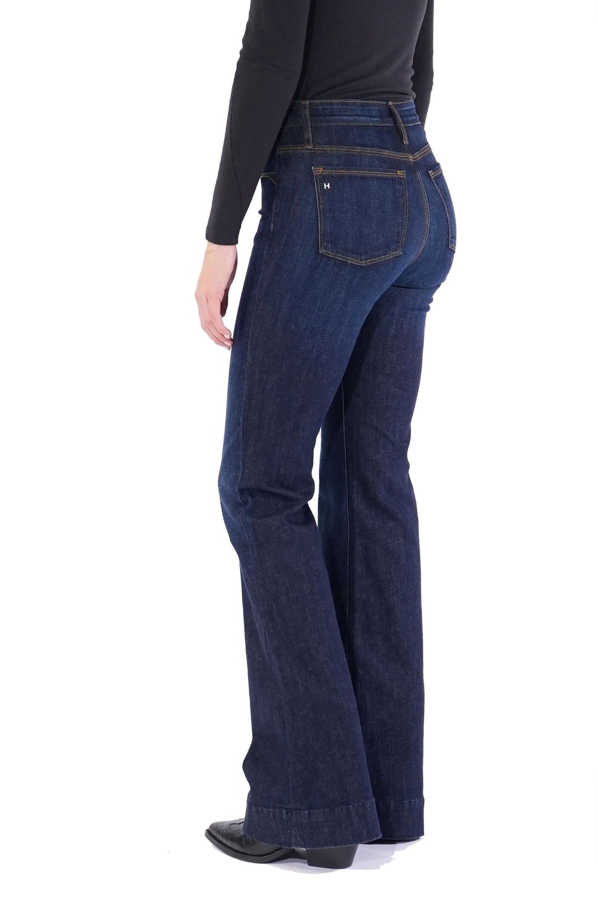 Haala Denim Bella flare trousers in deep ocean denim with gold accents, stylish bottoms featuring a fashionable wide-leg fit.