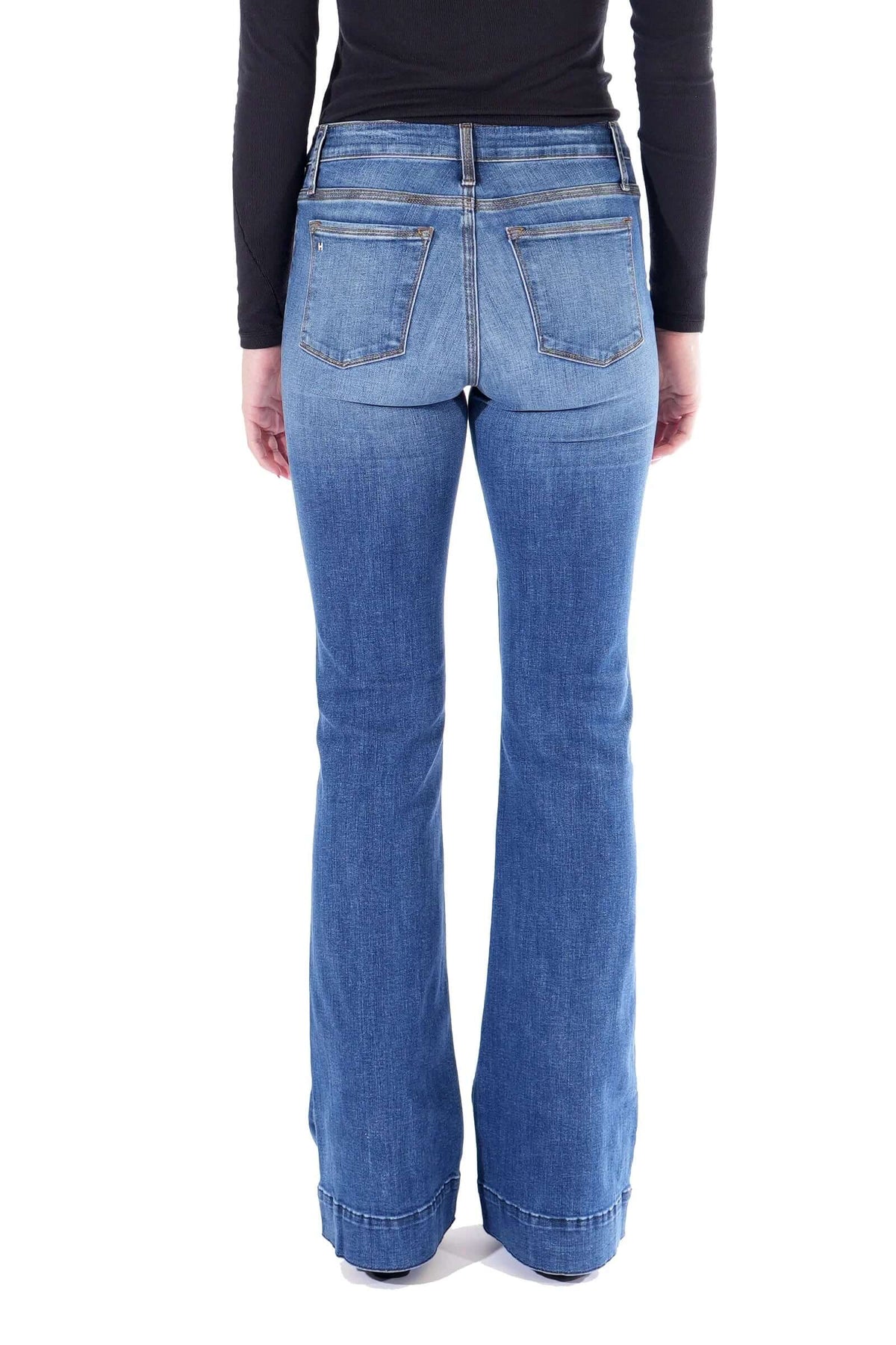 Haala Denim Bella flare trousers in indigo stone with gold accents, showcasing stylish denim bottoms with a flared fit.