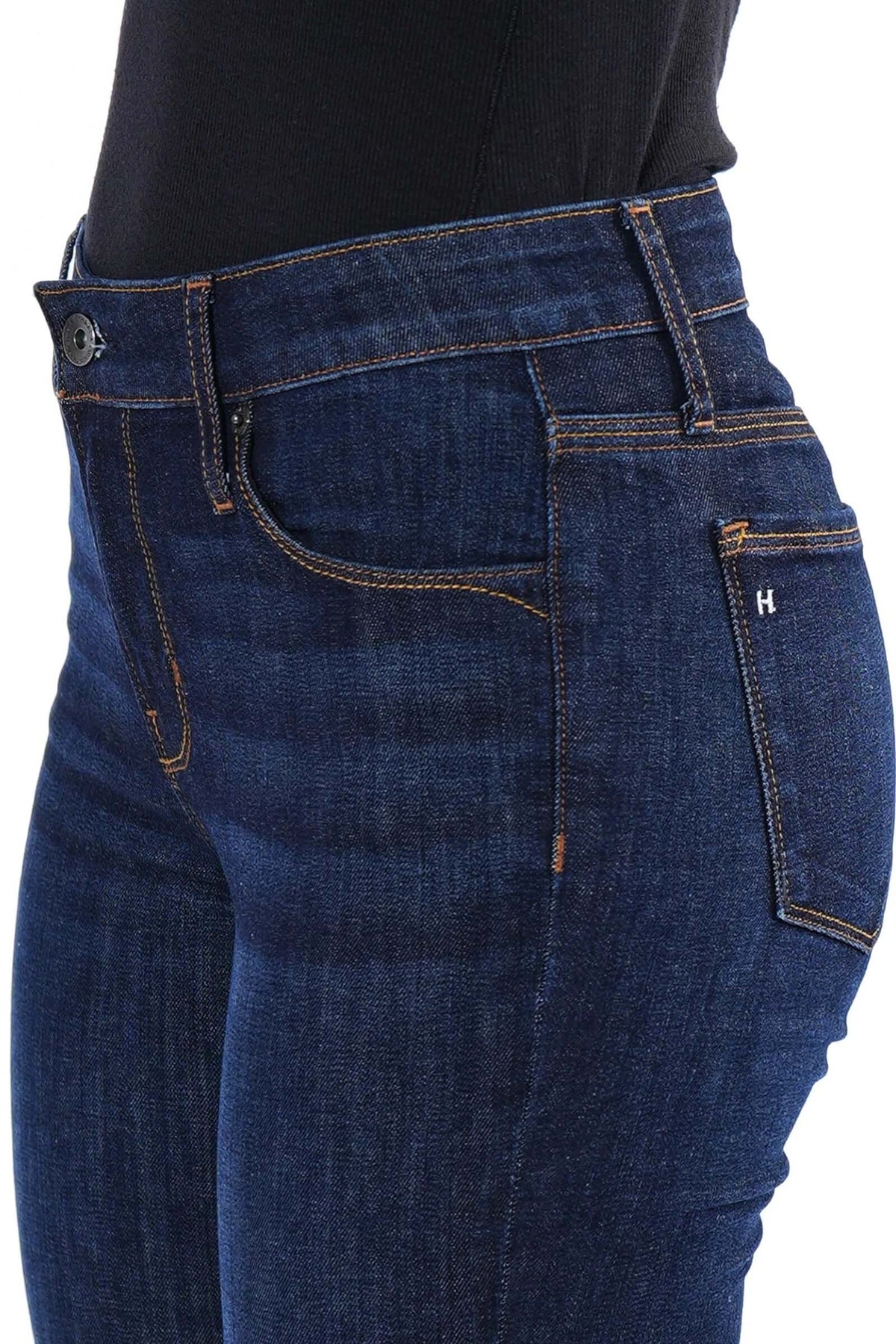 Haala Denim Bella flare trousers in deep ocean blue with gold accents, featuring a stylish high-waisted denim bottom.