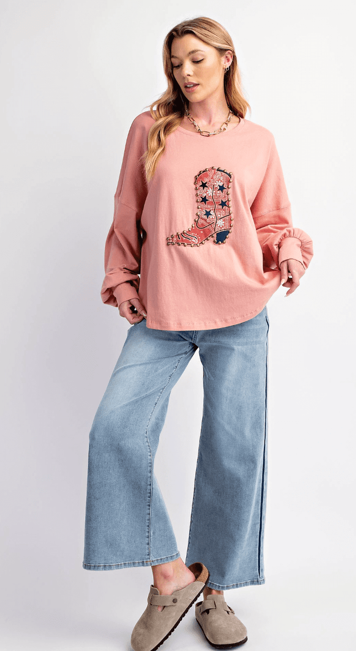 Easel jersey knit top with boots patch detailing, long sleeves, and a relaxed fit, perfect for casual wear.