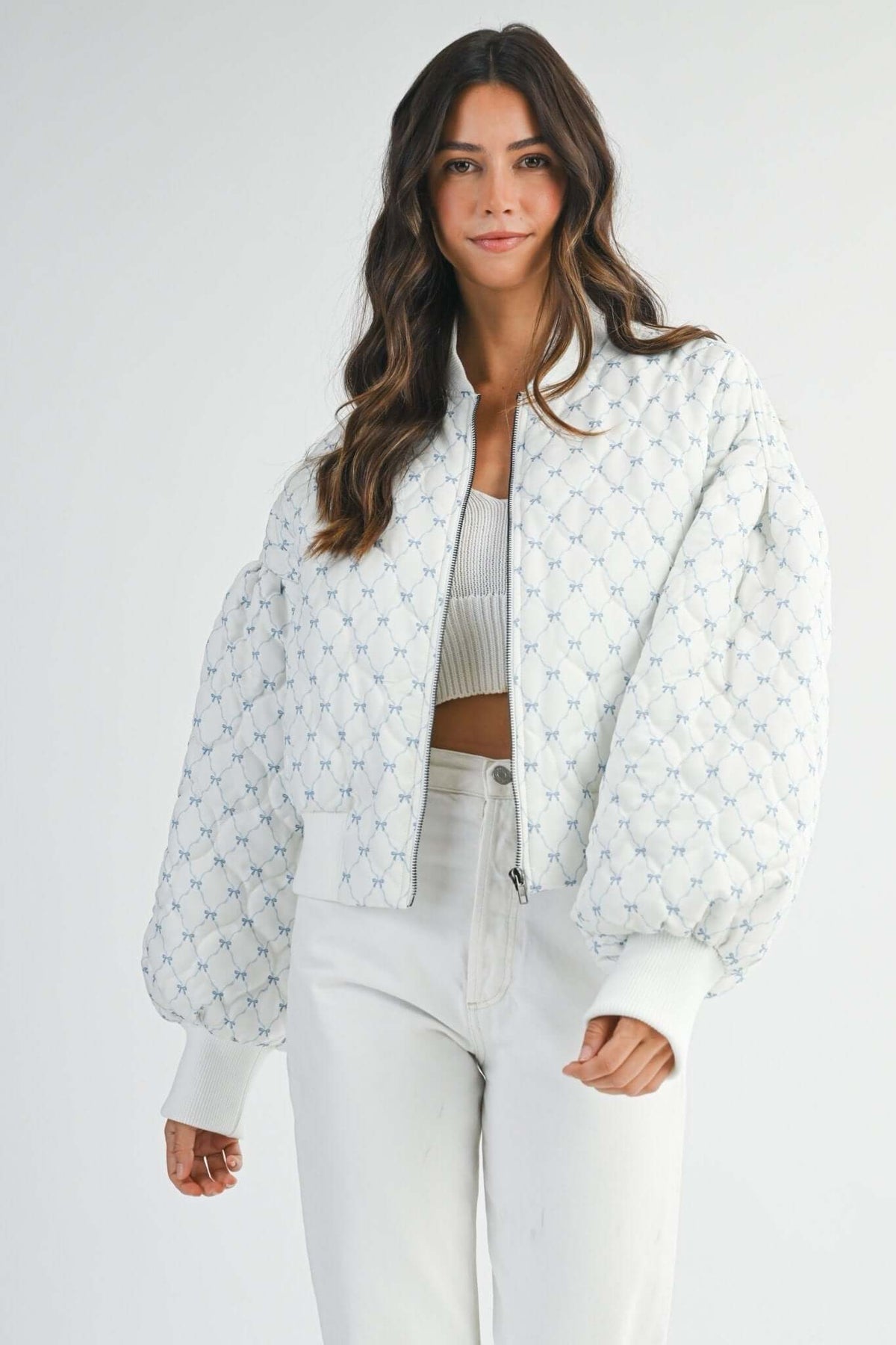Mable bow print oversized bomber jacket, stylish outerwear with a playful bow pattern, featuring a relaxed fit and front zipper.