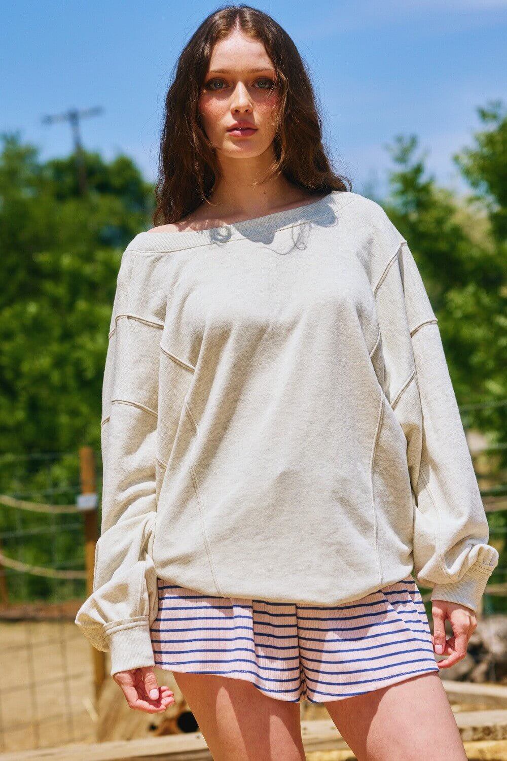 Bucketlist reversible twist-front washed terry sweatshirt top, graphic design, casual style, soft fabric, cozy unisex sweatshirt.