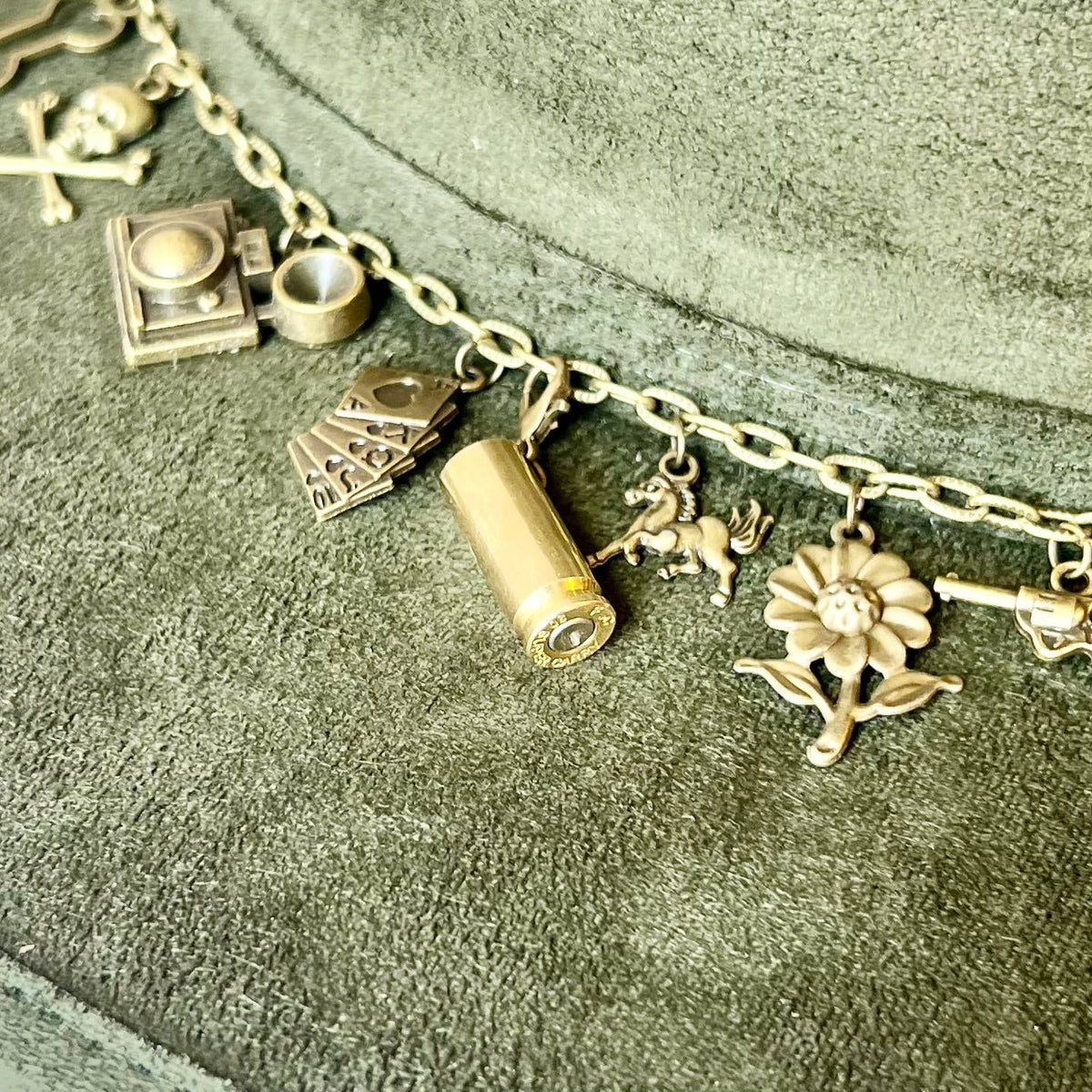 Brand Dandee bullet charm for .30 Super Carry, jewelry accessory featuring a detailed metallic bullet design.