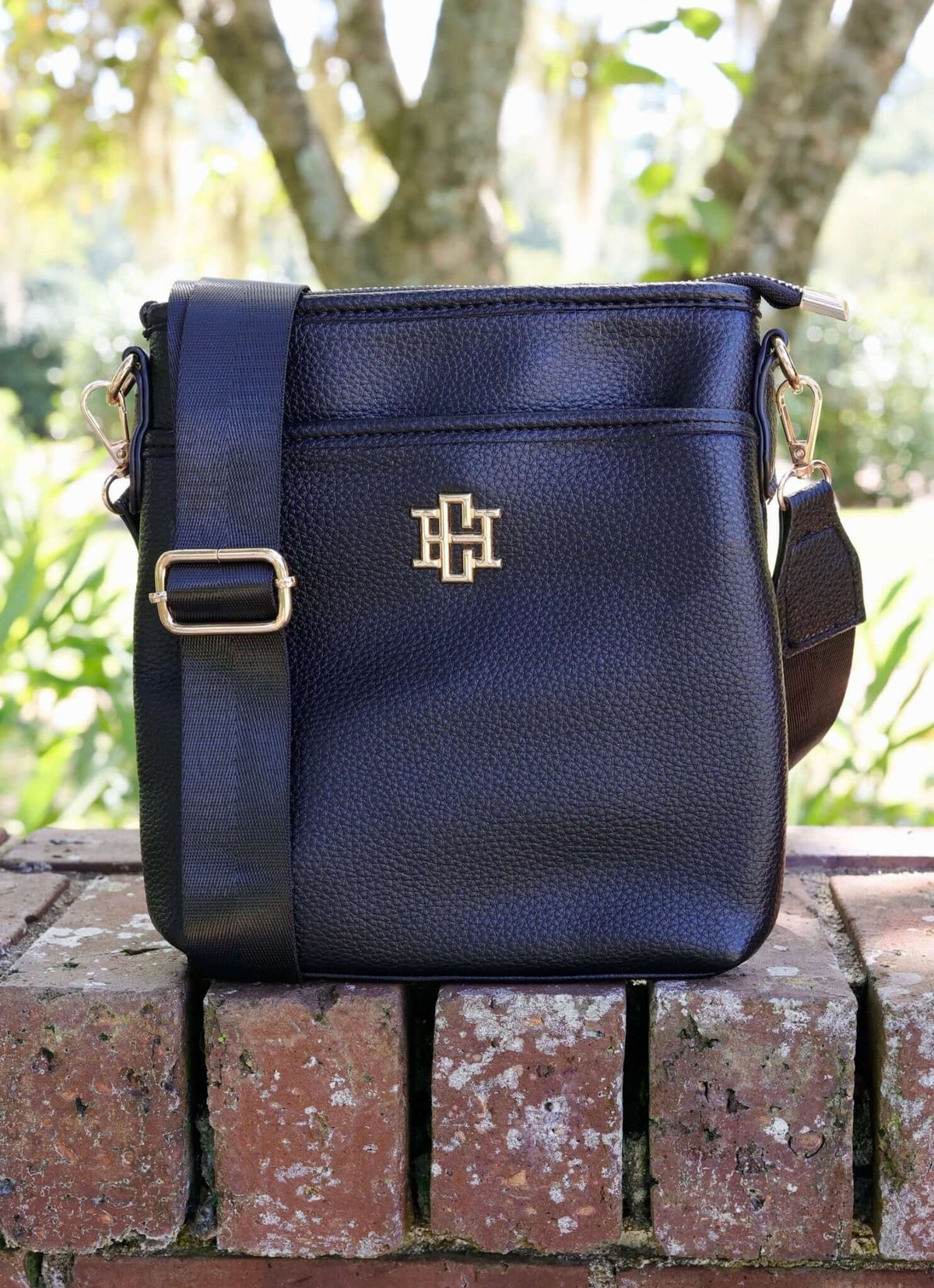 Caroline Hill vegan leather crossbody bag with adjustable strap, lightweight travel purse, stylish and functional for everyday use.