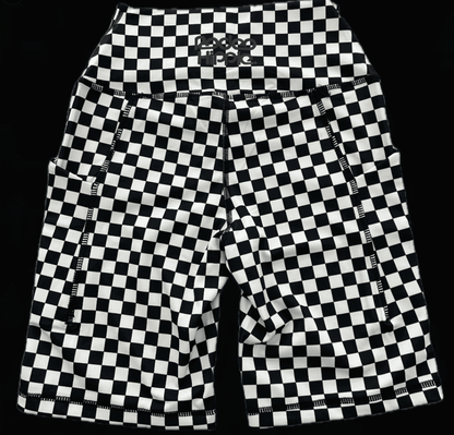 Rodeo Hippie checkered biker shorts in black and white activewear with a snug fit and high waist for sporty style.