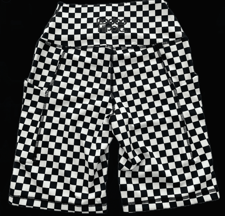 Rodeo Hippie checkered biker shorts in black and white activewear with a snug fit and high waist for sporty style.