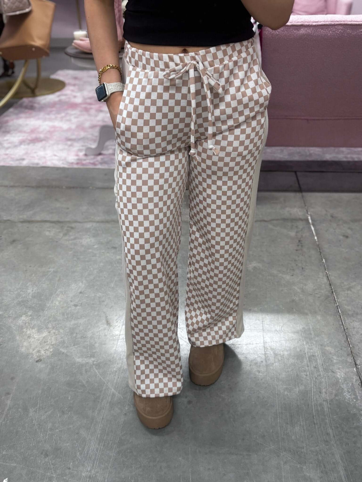Stylive checkered lounge pants featuring a comfortable fit and stylish black and white checkered pattern.