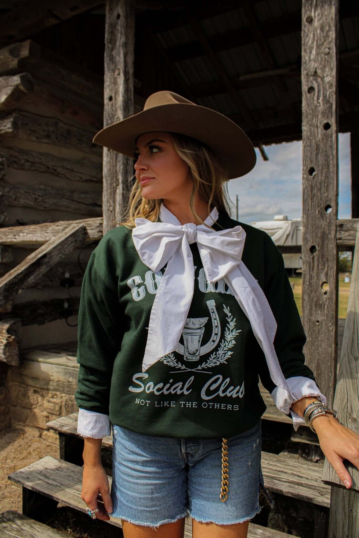 Gray graphic crewneck sweatshirt featuring the Cowgirl Social Club logo from Summer Tees, with a relaxed fit and casual style.