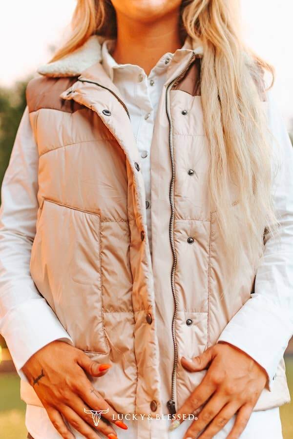 Cream puffer vest with camel yoke and sherpa neckline, stylish outerwear by Lucky & Blessed.