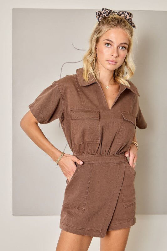 Day + Moon denim romper with flap pockets and wrap front detail, featuring a stylish, casual jumpsuit design perfect for warm weather.
