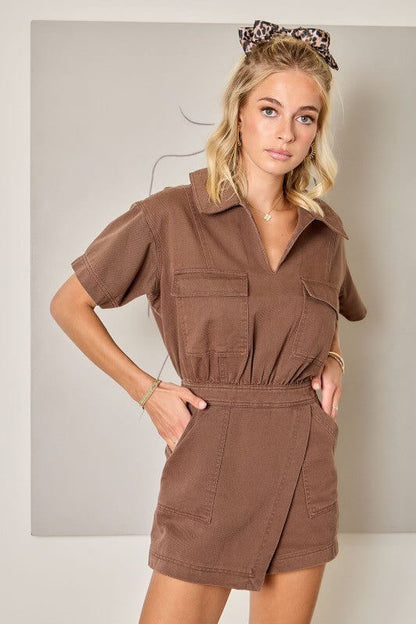 Day + Moon denim romper with flap pockets and wrap front detail, featuring a stylish, casual jumpsuit design perfect for warm weather.