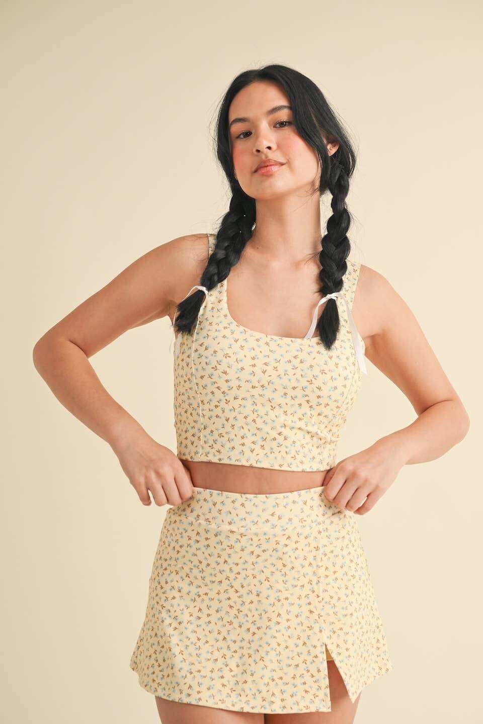 Ditsy print twist-back crop tank top by Kimberly C featuring lightweight fabric and stylish back twist detail.