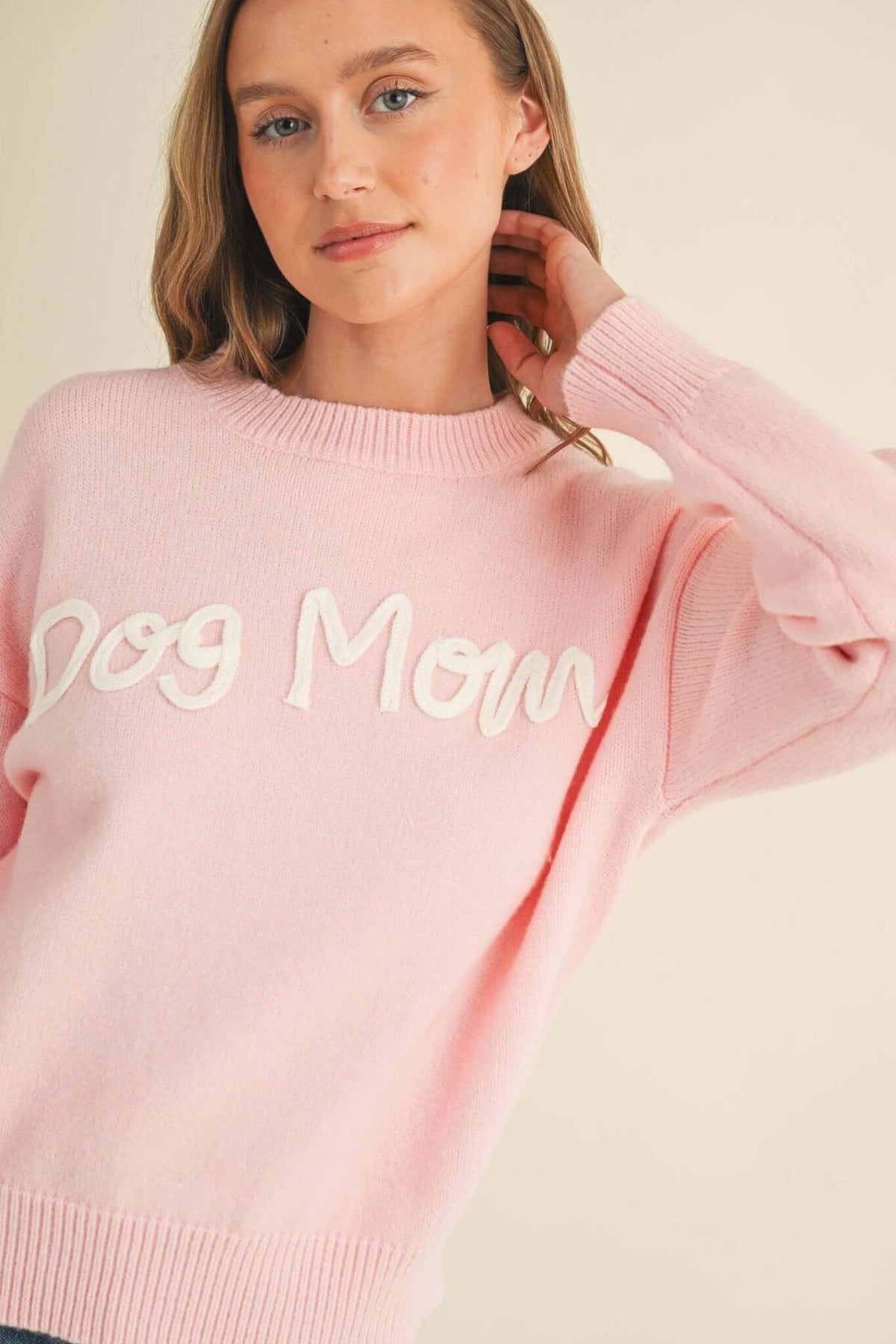 Dog Mom sweater by Cloud Ten featuring a cozy knit design, perfect for dog lovers and pet owners.