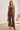 Mocha polka dot strapless two-piece pant set with wide-leg pants and matching top by Sunday Up, perfect for stylish casual wear.