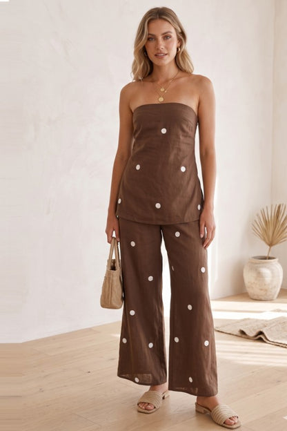 Mocha polka dot strapless two-piece pant set with wide-leg pants and matching top by Sunday Up, perfect for stylish casual wear.