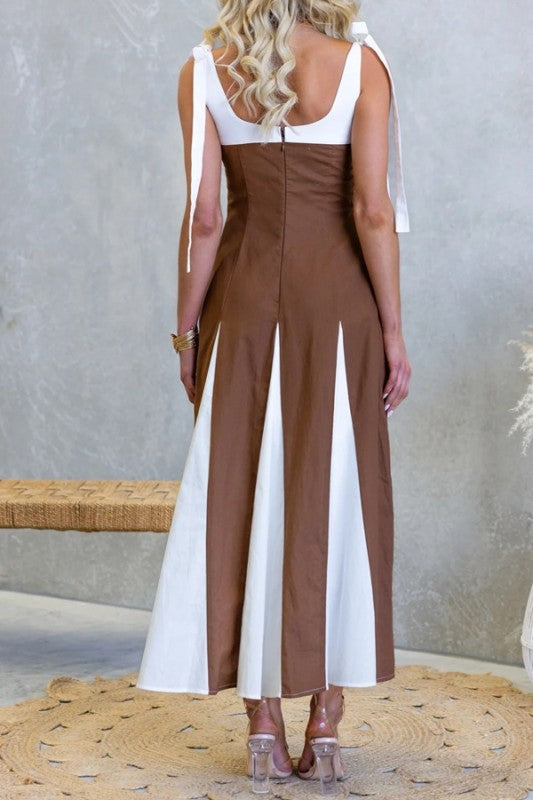 Brown and ivory contrast tie-shoulder maxi dress by Sunday Up, featuring a flowing silhouette and elegant design.