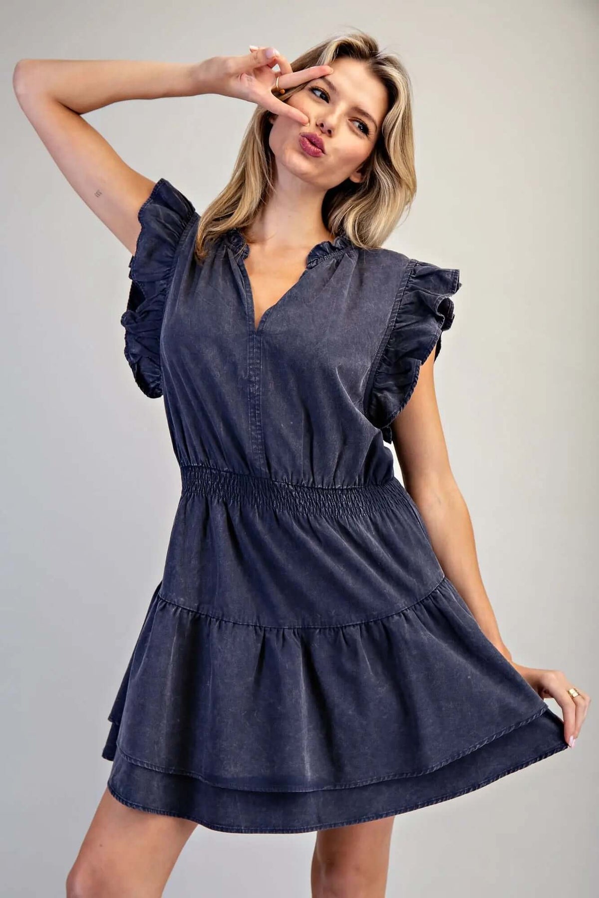 ee:some mineral washed smocked waist mini dress, lightweight summer dress with relaxed fit and stylish design, worn by a model.