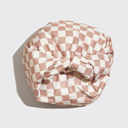KITSCH satin-lined flexi shower cap in terracotta checker pattern, waterproof and comfortable hair protection for shower or bath.