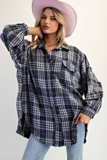 Navy plaid flannel oversized button-up shirt by Easel, featuring a relaxed fit and classic plaid pattern, perfect for casual wear.
