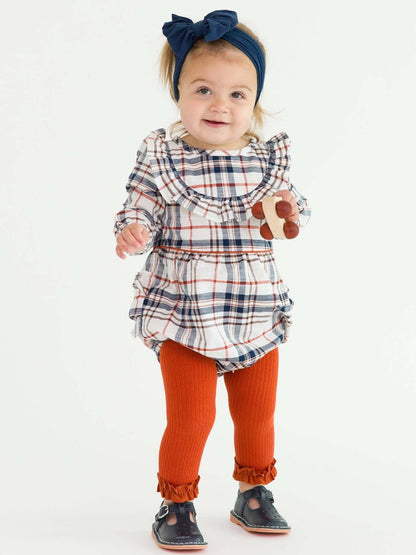 Girls Rust Rib Knit Footless Ruffled Tights from RuffleButts + RuggedButts, featuring a ribbed knit design and ruffled accents.