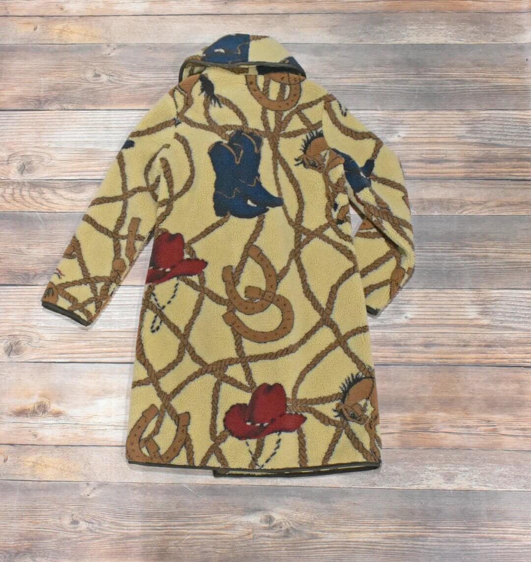 Tasha Polizzi Hathaway coat, stylish outerwear jacket with a tailored fit and textured fabric, displayed on a hanger.