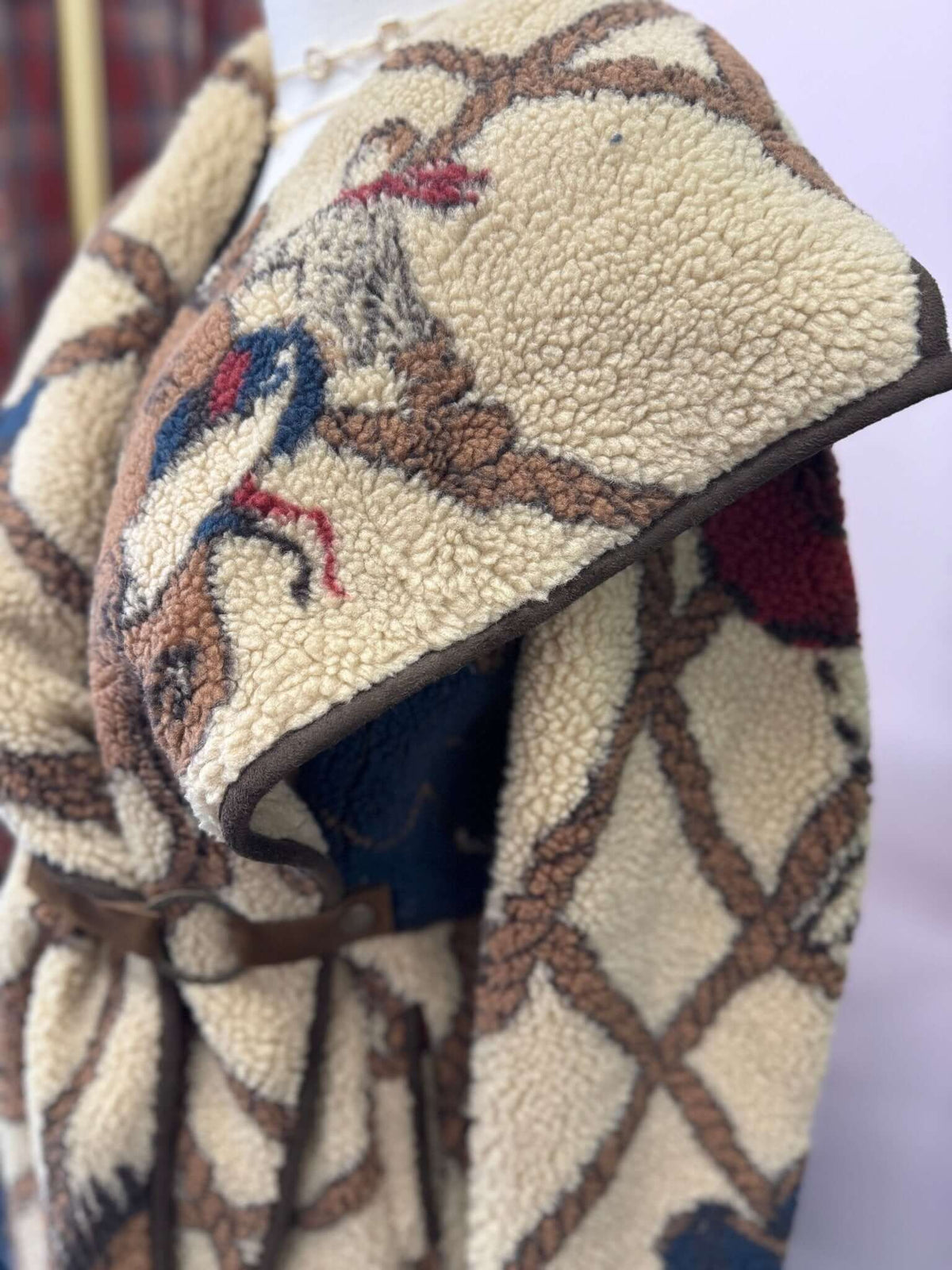Tasha Polizzi Hathaway coat, stylish outerwear jacket with a tailored fit and detailed design, suitable for cold weather.