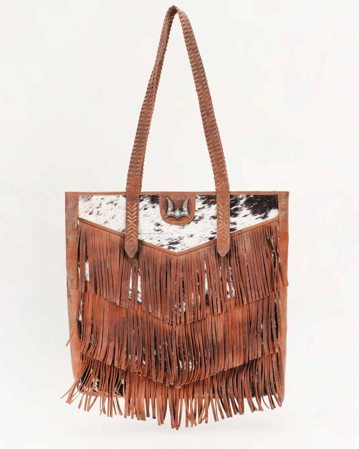 Loyal West Myra bag with fringe and cowhide design, large purse featuring natural leather texture and stylish details.