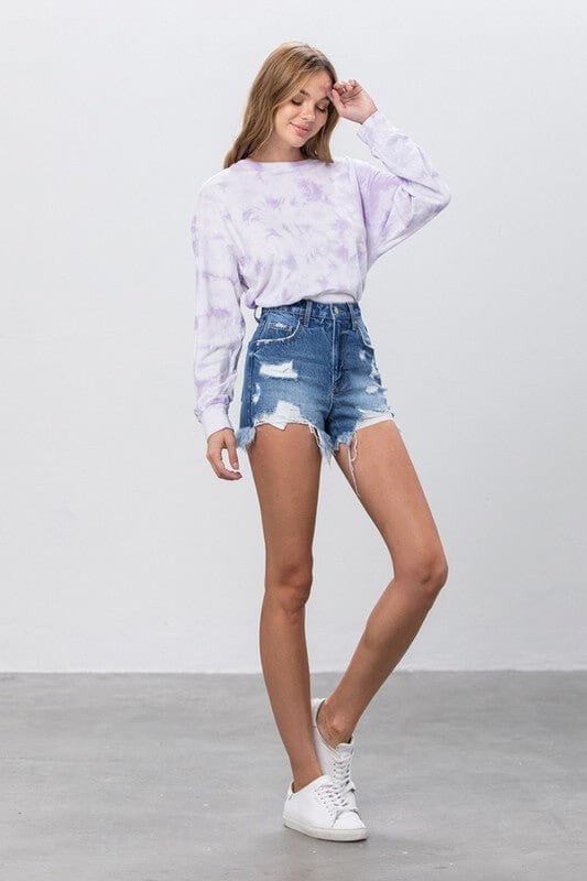 Insane Gene high-rise distressed denim shorts with raw hem, showcasing a casual, worn-in style and frayed edges.