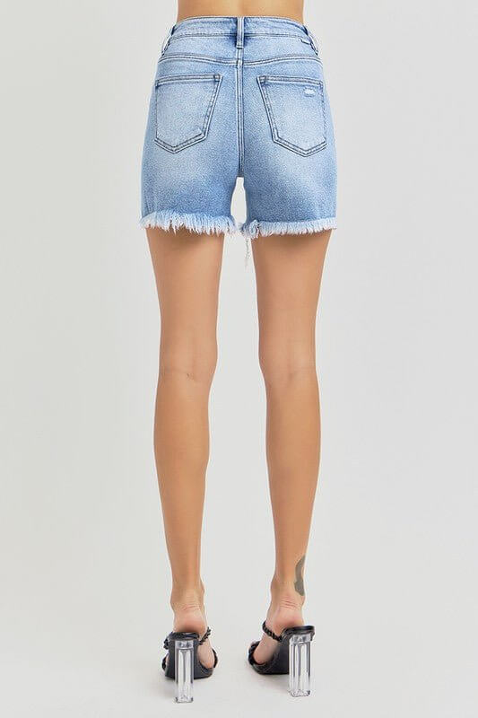 Risen high-rise distressed denim shorts with mid-thigh length and classic cutoff style, featuring a 5-inch inseam.