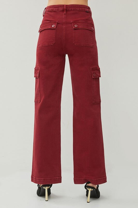 Risen high-rise wide-leg cargo pants in durable fabric with large front and side pockets, styled for casual wear.