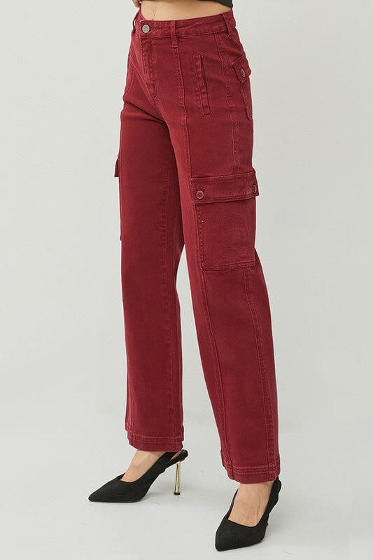 Risen high-rise wide cargo pants with multiple pockets, made from durable fabric, shown in a relaxed fit style.