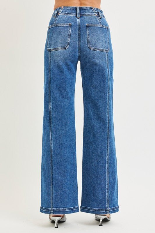 Risen high-rise wide jeans with front and back curved seams, showing the fit and design details from the front and back views.