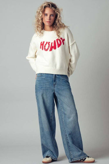 Urban Daizy Howdy slogan relaxed knit sweater featuring a casual fit and cozy fabric, perfect for comfortable everyday wear.