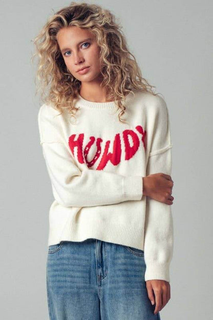 Urban Daizy Howdy slogan relaxed knit sweater with a cozy fit and casual style, featuring a bold "Howdy" graphic on the front.