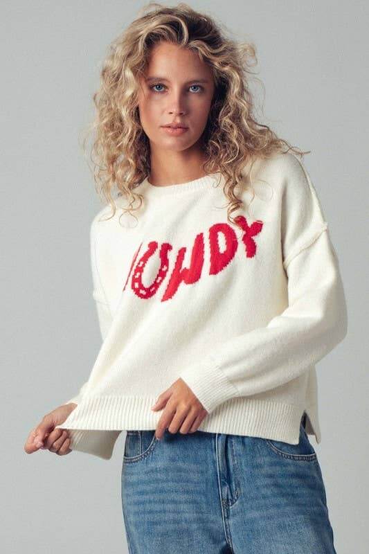 Urban Daizy Howdy slogan relaxed knit sweater with a cozy fit, featuring bold lettering on soft, comfortable knit fabric.
