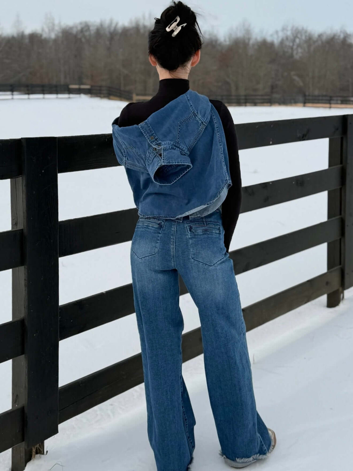 High-rise Judy Blue column straight jeans with button detail, showcasing the classic fit and clean denim look.
