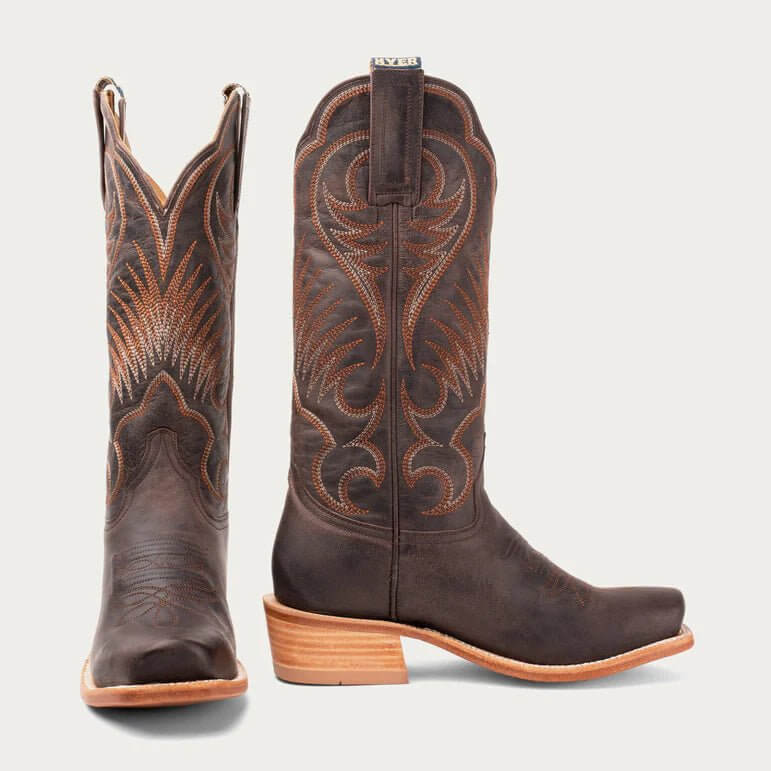HYER Leawood boots featuring sleek leather design, pointed toe, and stacked heel, stylish footwear for versatile looks.
