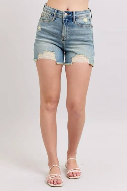 Judy Blue high-rise washed denim shorts with fly stitch detail and distressed destroy accents, casual summer bottoms.