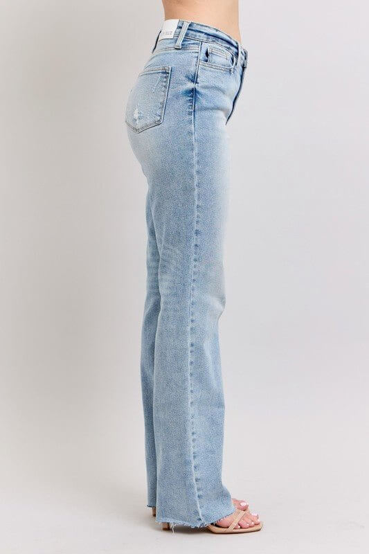 Light wash Judy Blue high waist dad jeans with relaxed fit, showcasing classic denim style and casual bottom wear.