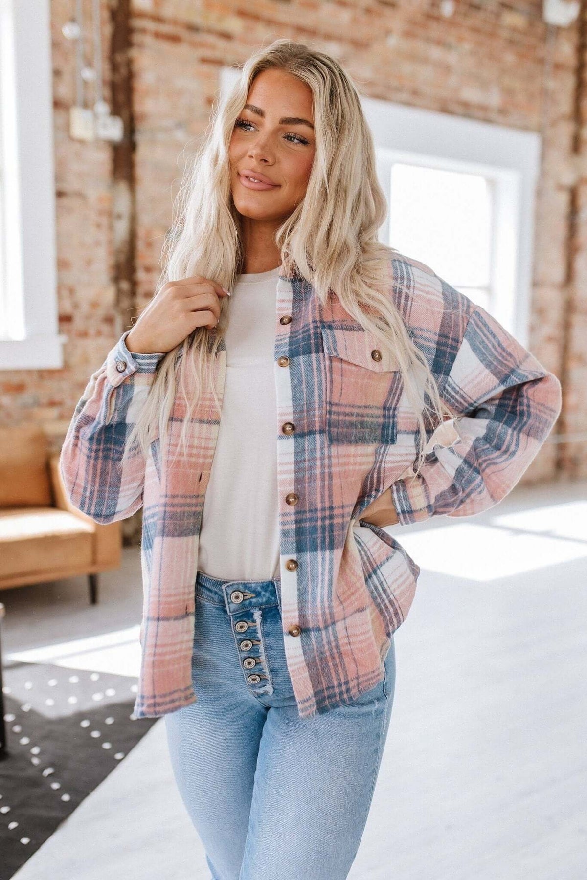 Kelsea plaid shacket by Liam & Company featuring a stylish plaid pattern, button front, and relaxed fit outerwear for casual wear.