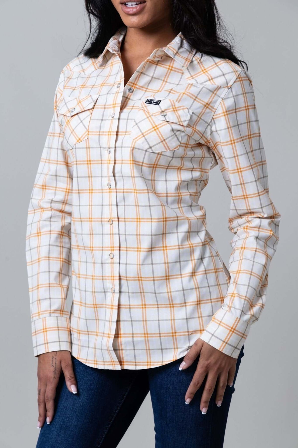 Kimes Ranch Ladies Lucas plaid long sleeve shirt in natural color, stylish western-inspired blouse with button-down front.