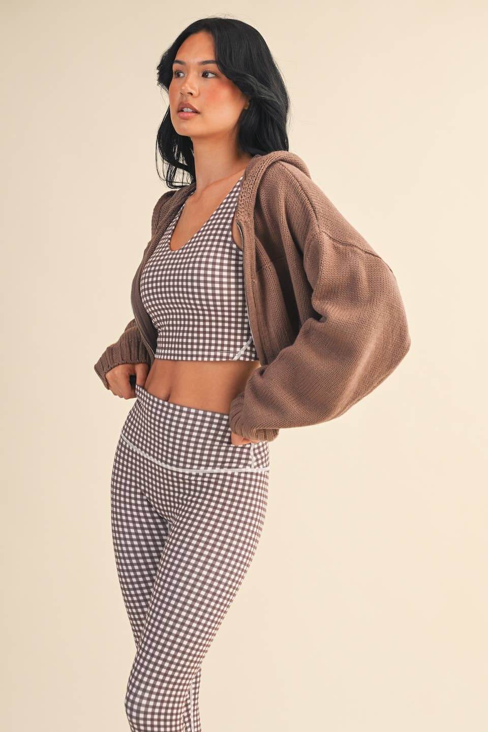 Image of a Luxe High-Waist Satin Midi Skirt by KIMBERLY C, featuring a smooth, silky finish and elegant midi length.