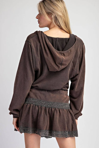 Black lace point mini skirt by ee:some, featuring a fitted high waist and intricate lace detailing.