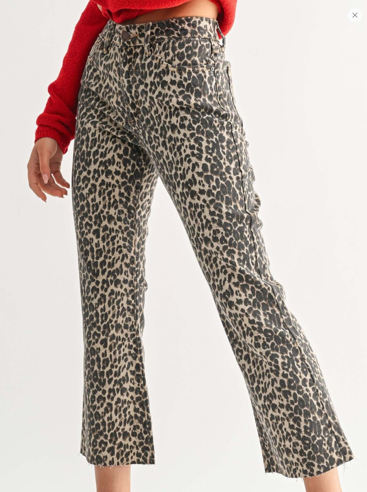 JBD Just Black Denim leopard distressed hem jeans, stylish women's bottoms with trendy animal print and ripped details.