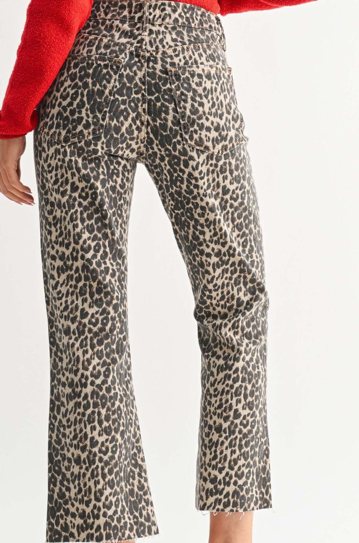 JBD Just Black Denim leopard print distressed hem jeans, casual bottoms with a stylish animal pattern and frayed edges.