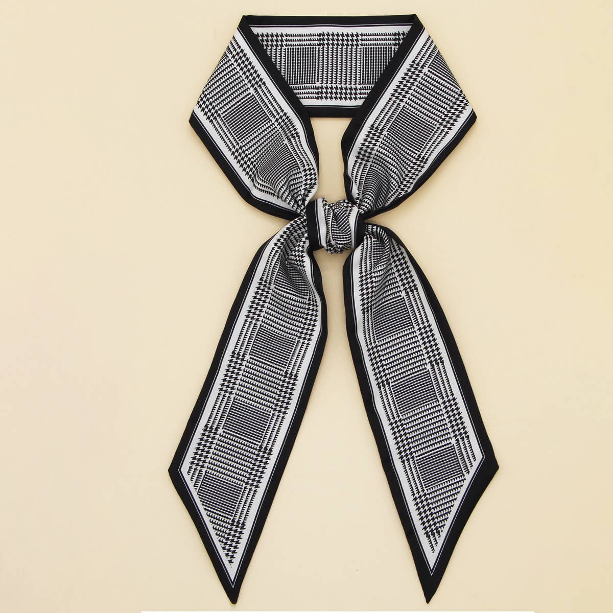 ACCITY Letter Floral Twilly Scarf used as hair ribbon and bag tie, featuring vibrant floral and letter print design.