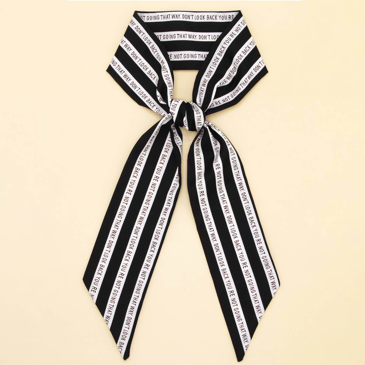 ACCITY Letter Floral Twilly Scarf styled as a hair ribbon and bag tie with vibrant floral and letter pattern.