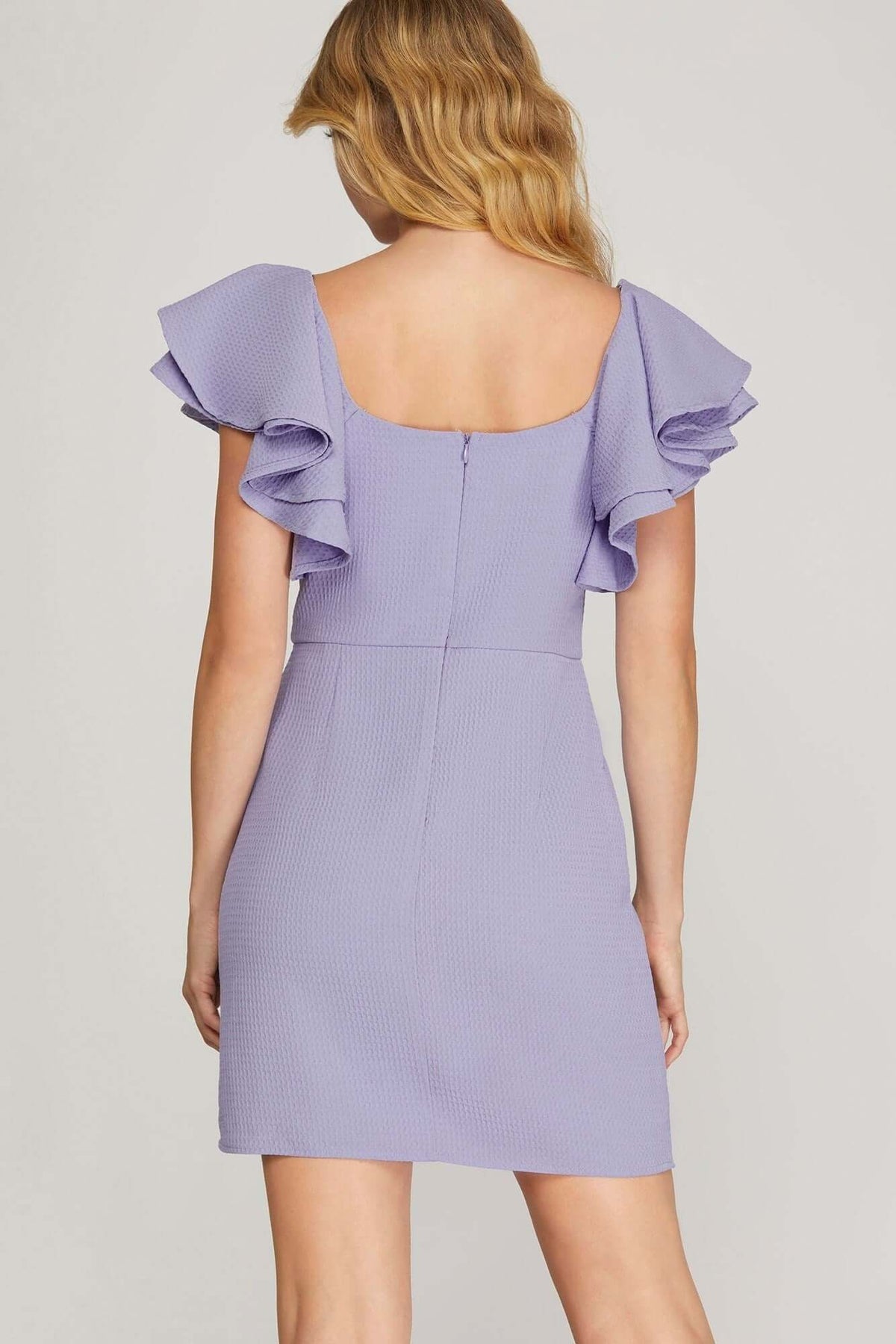 Lilac She and Sky mini dress with double ruffle sleeves, textured fabric, square neckline, and fit-and-flare silhouette.