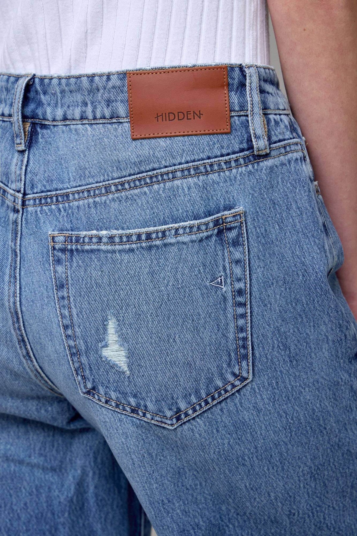 Relaxed fit Logan Classic Dad Jeans by Hidden Jeans, showing light blue denim with classic five-pocket design and straight leg cut.